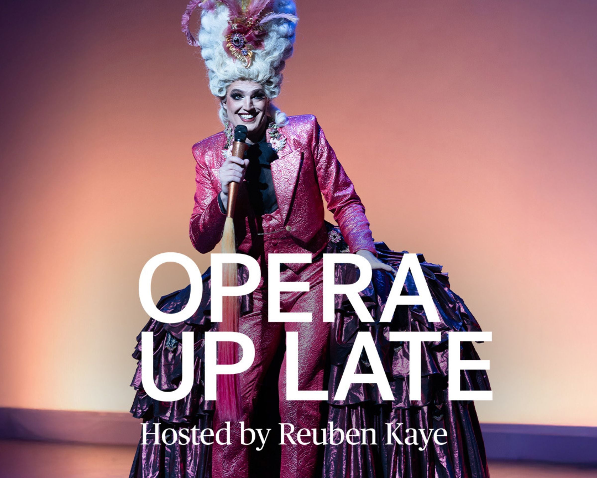 Drag performer in powdered wig and sparkly pink suit holds microphone. Text 'OPERA UP LATE'.